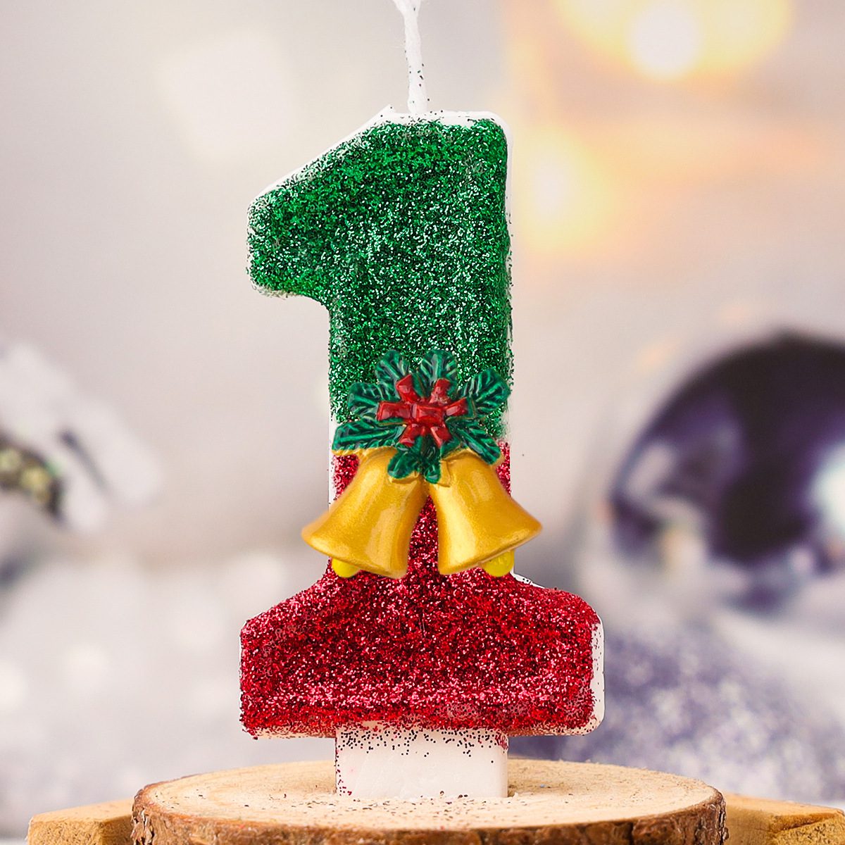 Celebrate birthdays in style with our festive birthday number candles. This glittery number 6 candle is perfect for adding a touch of sparkle to any birthday cake. Made from high-quality, non-toxic materials, our birthday number candles are safe for all ages. The vibrant green and red glitter design, adorned with charming holiday bells, makes this candle a standout decoration for any celebration. Whether you're celebrating a child's sixth birthday or marking a special milestone, this candle is sure to make the occasion memorable. Easy to insert into any cake, our birthday number candles burn evenly and brightly, ensuring a delightful experience for everyone. Make every birthday special with our beautifully designed number candles. Order now and add a festive touch to your next celebration.